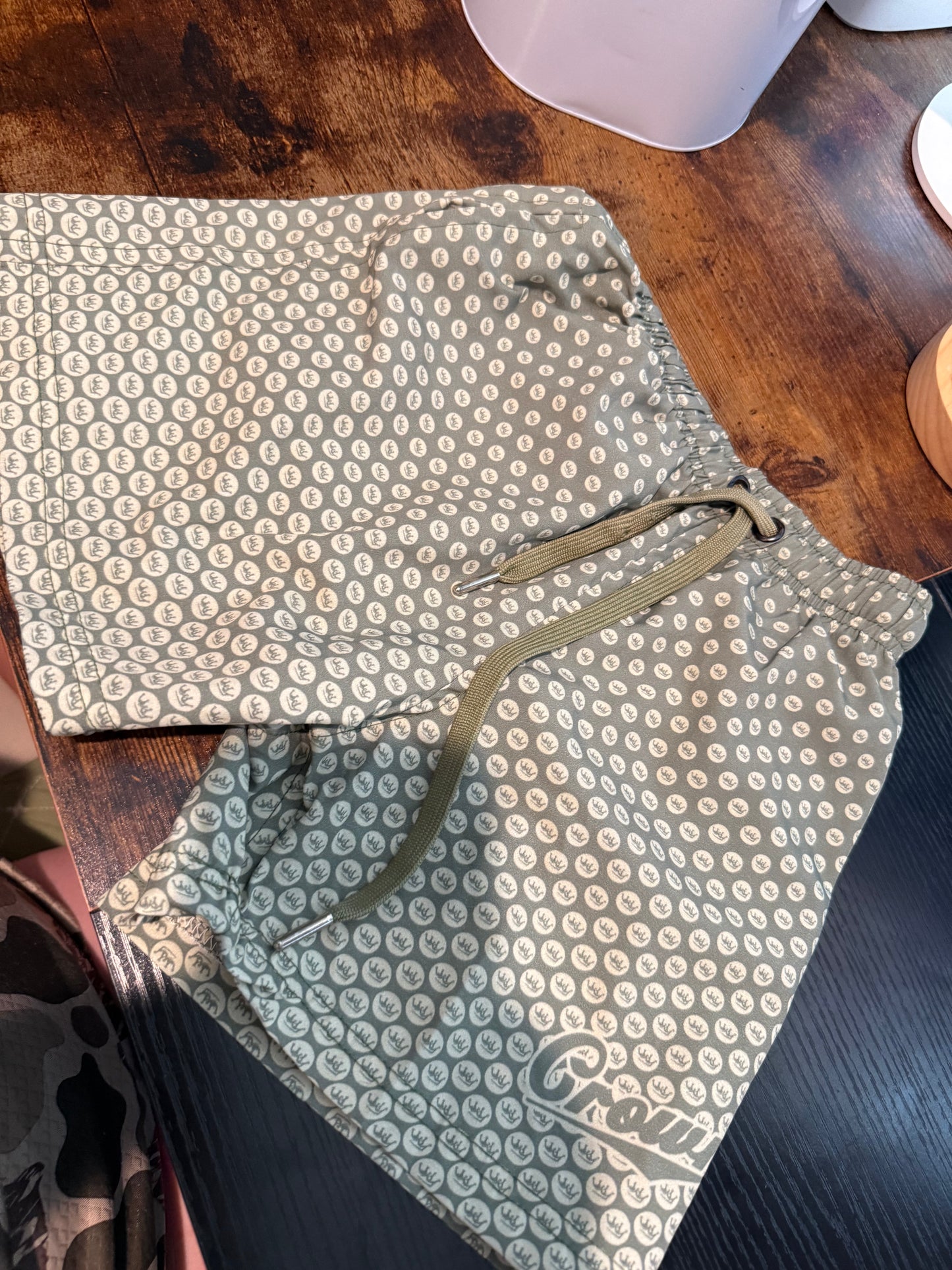 Green crown shorts